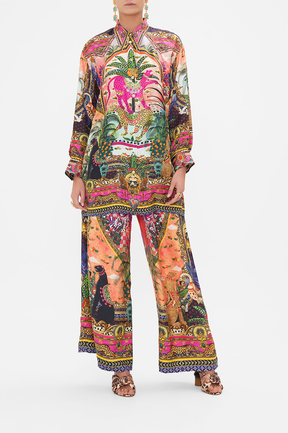 Front view of model wearing CAMILLA silk long sleeve top in Alessandro's Atlantis print