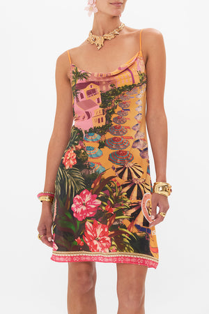Crop view of model wearing CAMILLA silk slip dress in Capri Me print