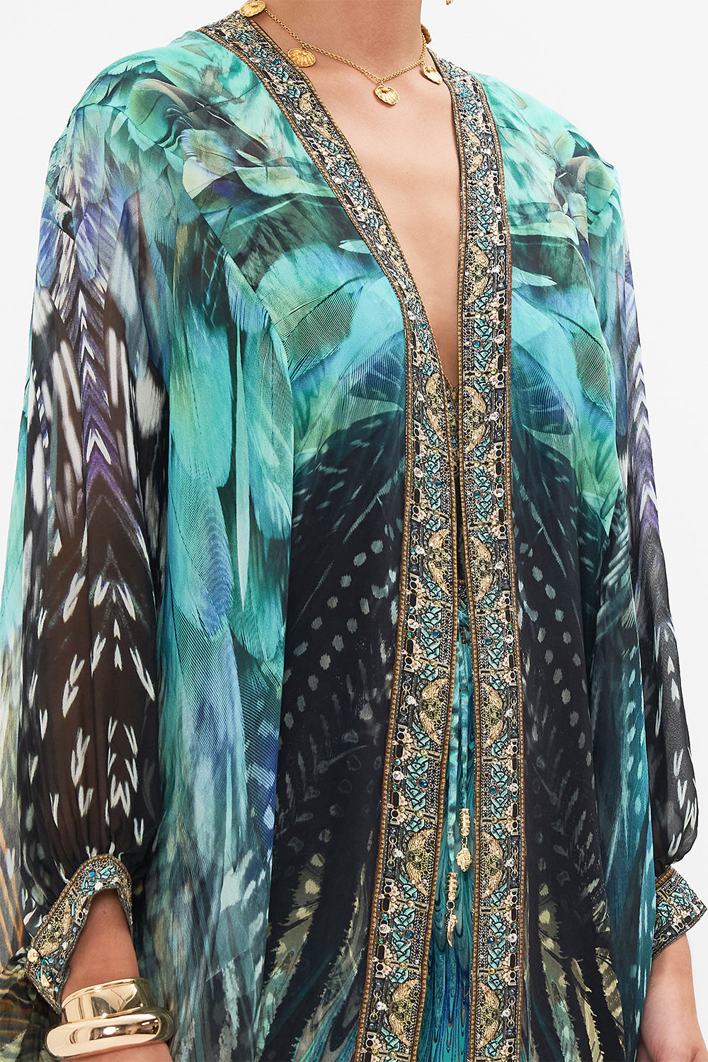 Detail view of model wearing CAMILLA silk kimono layer in Azure Allure print