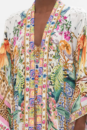 Detail view of model wearing CAMILLA floral silk kimono in Flowers of Neptune print