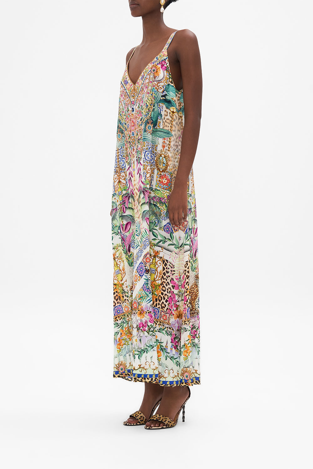 Side view of model wearing CAMILLA floral silk slip dress in Flowers Of Neptune print 