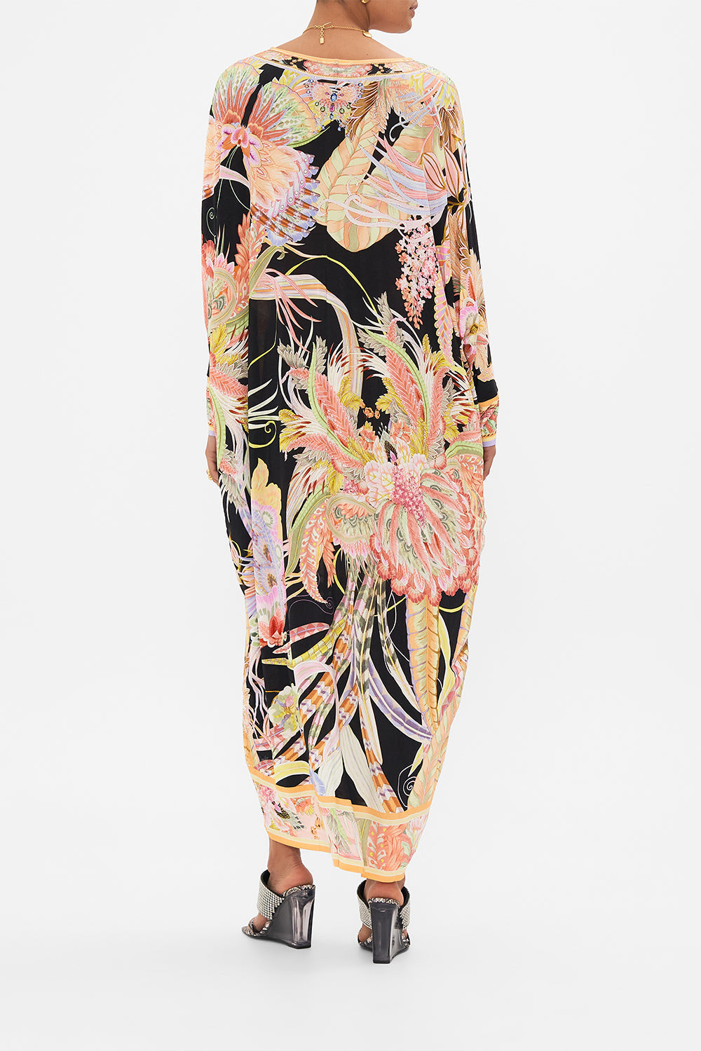 Back view of model wearing CAMILLA designer jersey kaftan in Lady of The Moon print