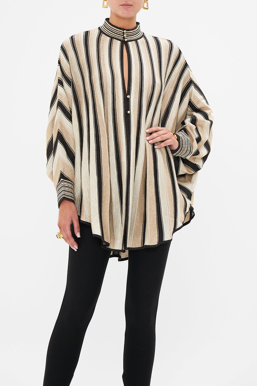 Crop view of model wearing CAMILLA luxury knit in Soul Of A Star Gazer print