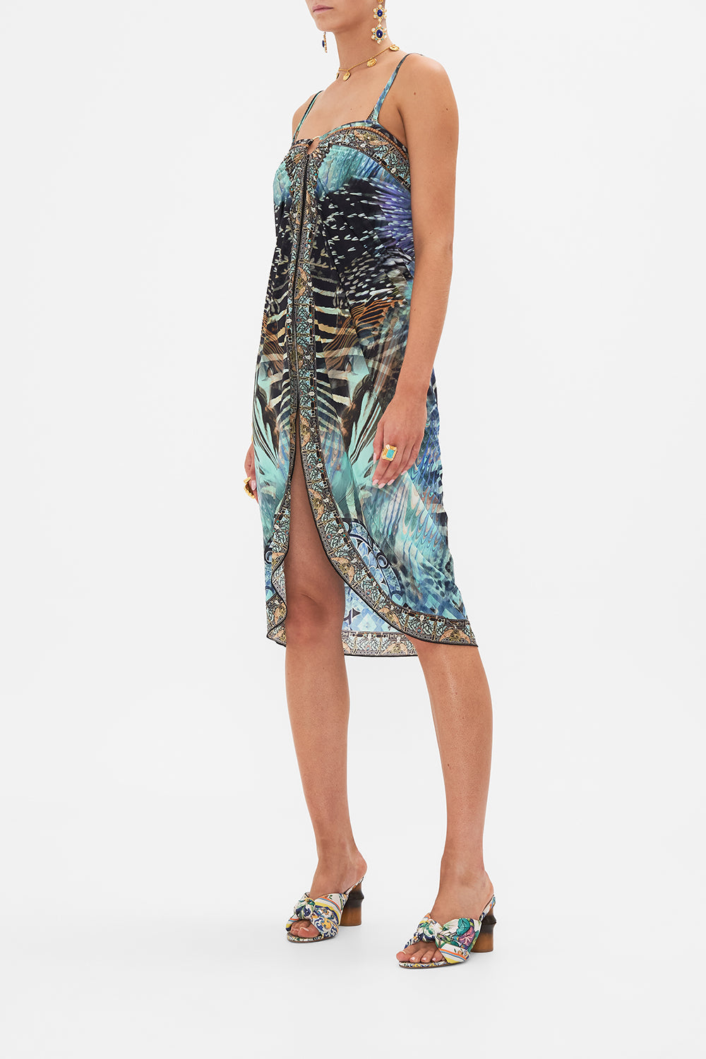 Side view of model wearing CAMILLA resortwear sarong in Azure Allure