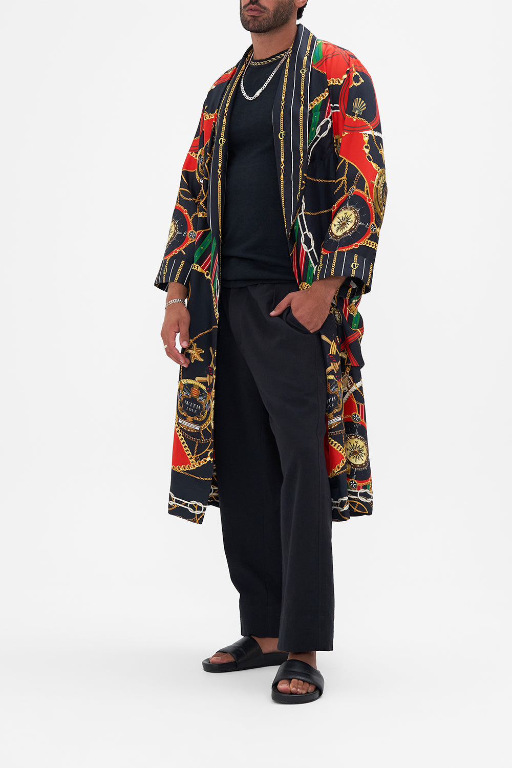 Side view of model wearing Hotel Franks by CAMILLA silk robe in Club Aperitivo print 