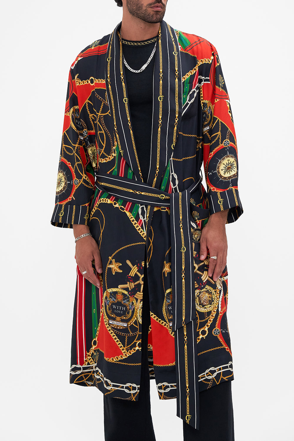 Crop view of model wearing Hotel Franks by CAMILLA silk robe in Club Aperitivo print 