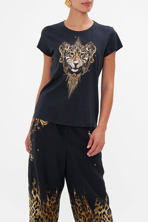 Crop view of model wearing CAMILLA black graphic tee in Lions Mane print