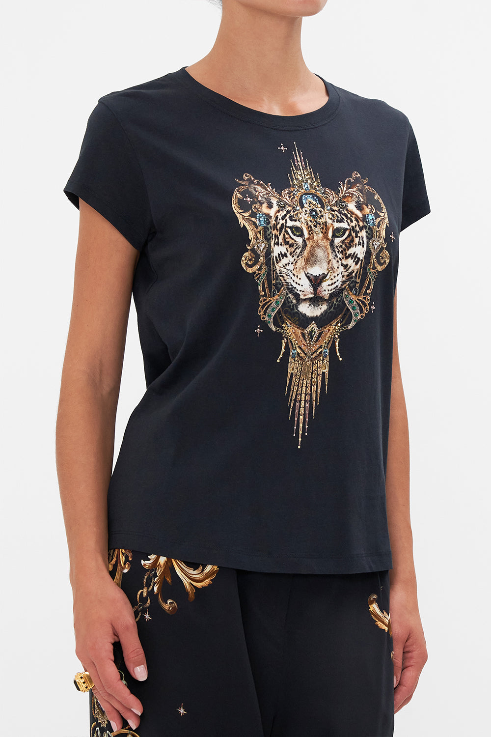 Detail view of model wearing CAMILLA black graohic tee in Lions Mane print