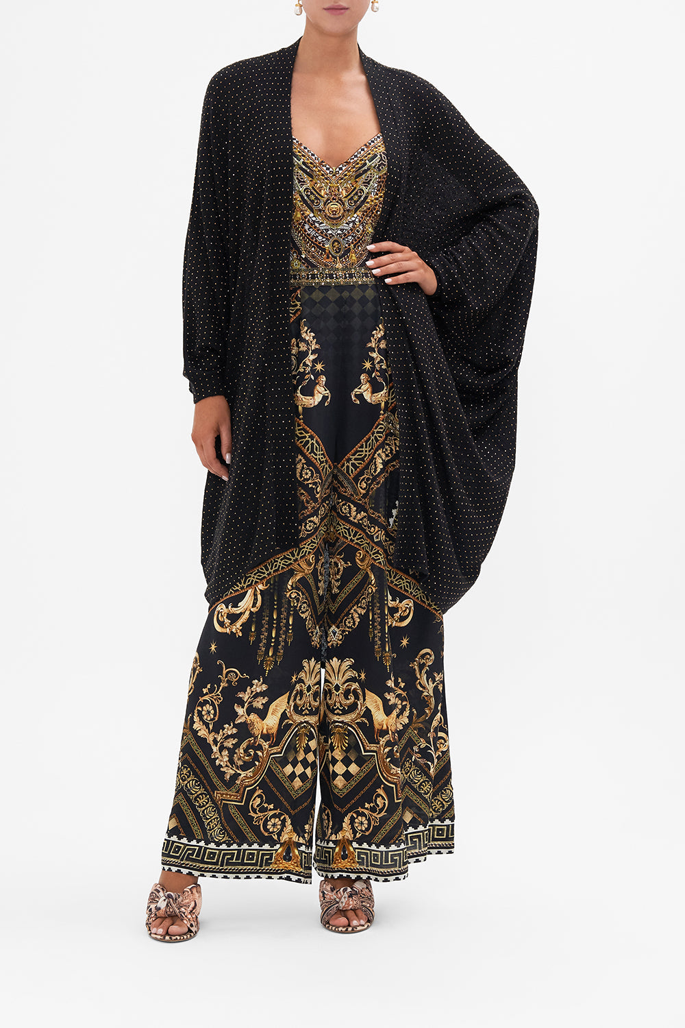 Front view of model wearing CAMILLA black knit cardigan in Duomo Dynasty