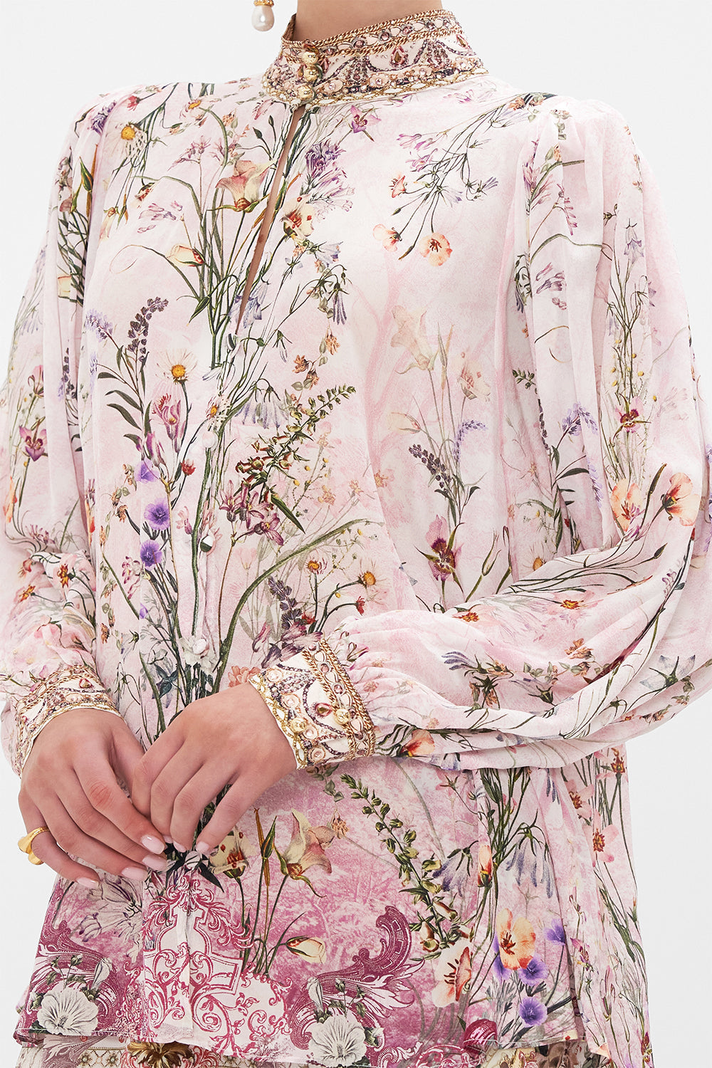 Detail view of model wearing CAMILLA floral slik blouse in Kissed By The Prince print