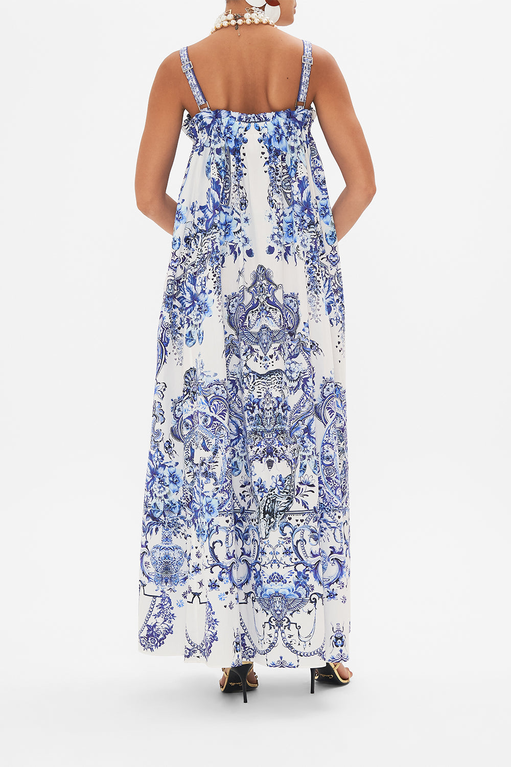Back view of model wearing CAMILLA blue and white  sun dress in Glaze and Graze print 