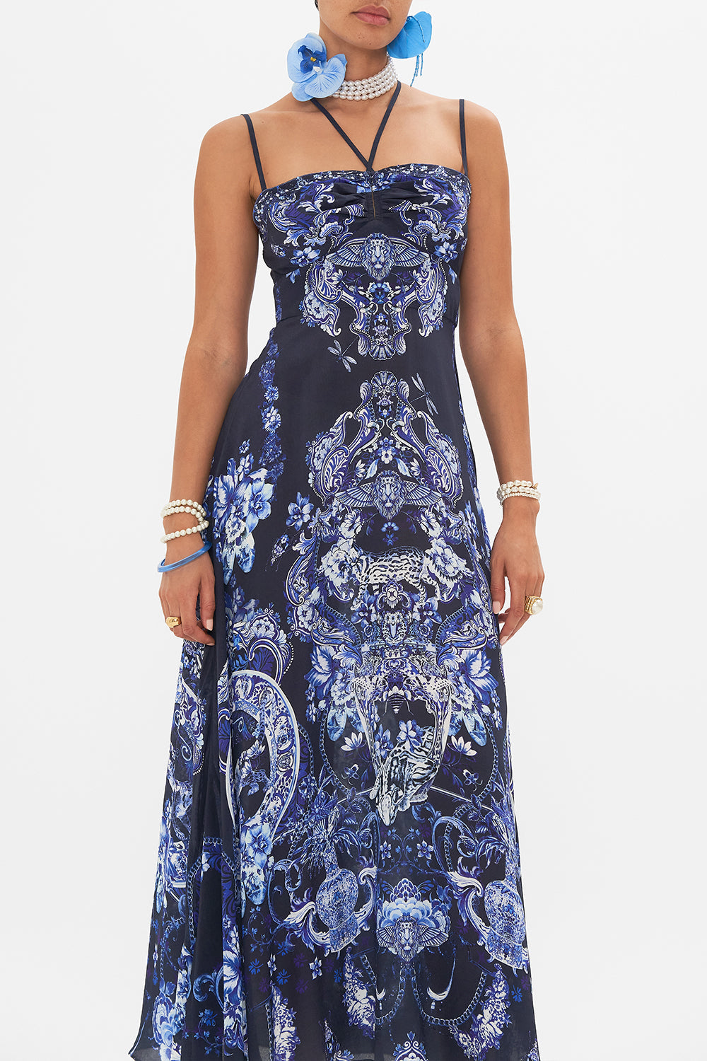 Crop view of model wearing CAMILLA silk dress in Delft Dynasty print
