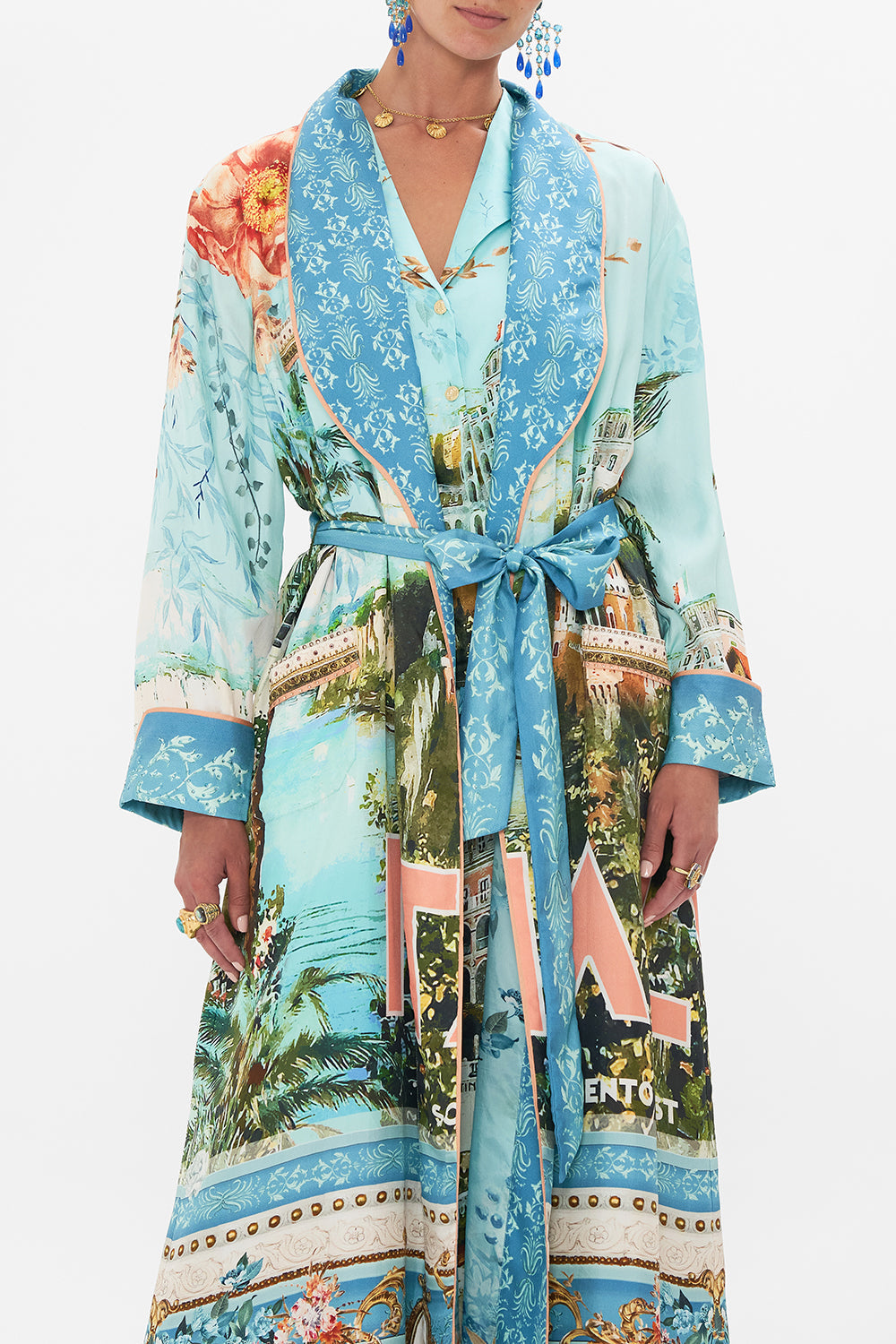 Crop view of model wearing CAMILLA long silk robe in From Sorrento With Love print 