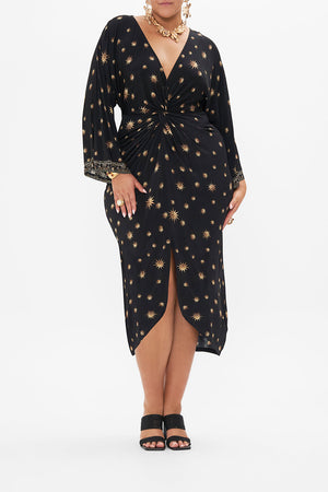 Front view of curvy model wearing CAMILLA plus size black jersey dress in Soul Of A Star Gazer print