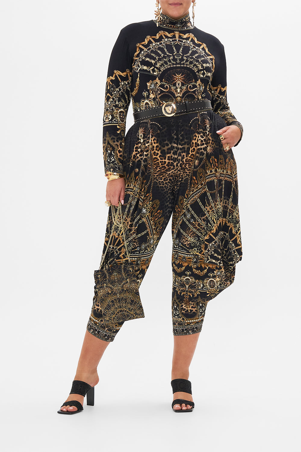 Front view of curvy model wearing CAMILLA plus size pants in Masked At Moonlight print