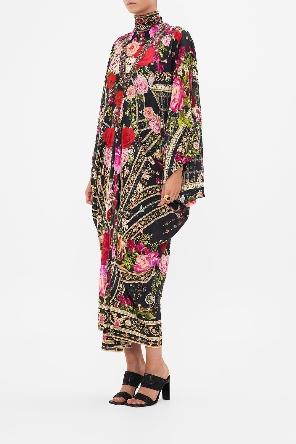 Detail view of model wearing CAMILLA  designer resort wear silk kaftan print in Reservation For Love print 