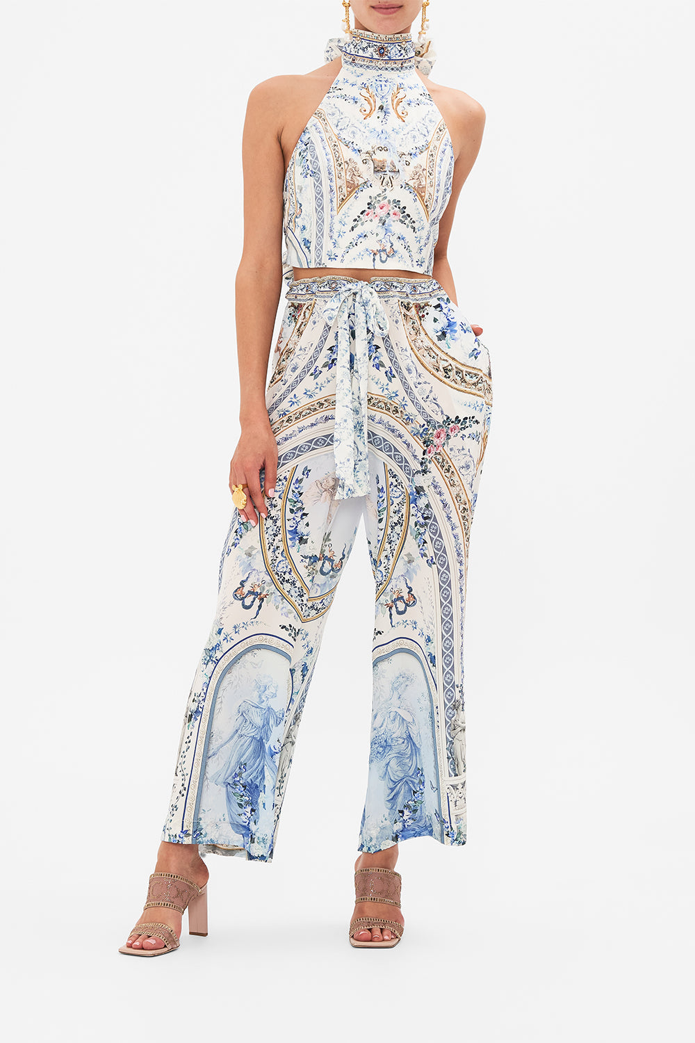 Front view of model wearing CAMILLA blue silk pants in Season Of The Siren print 