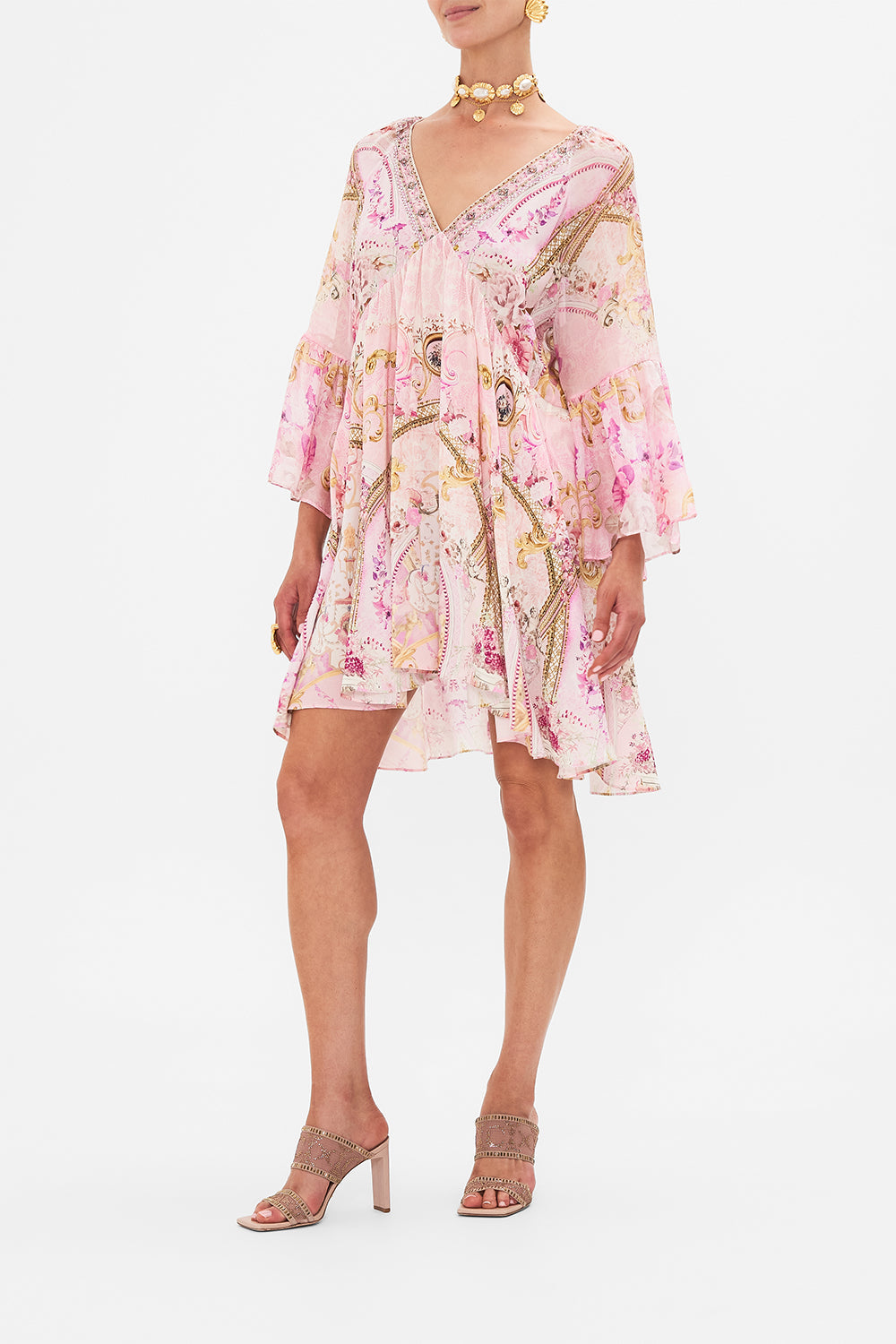 Side view of model wearing CAMILLA pink silk dress in Fresco Fairytale print 