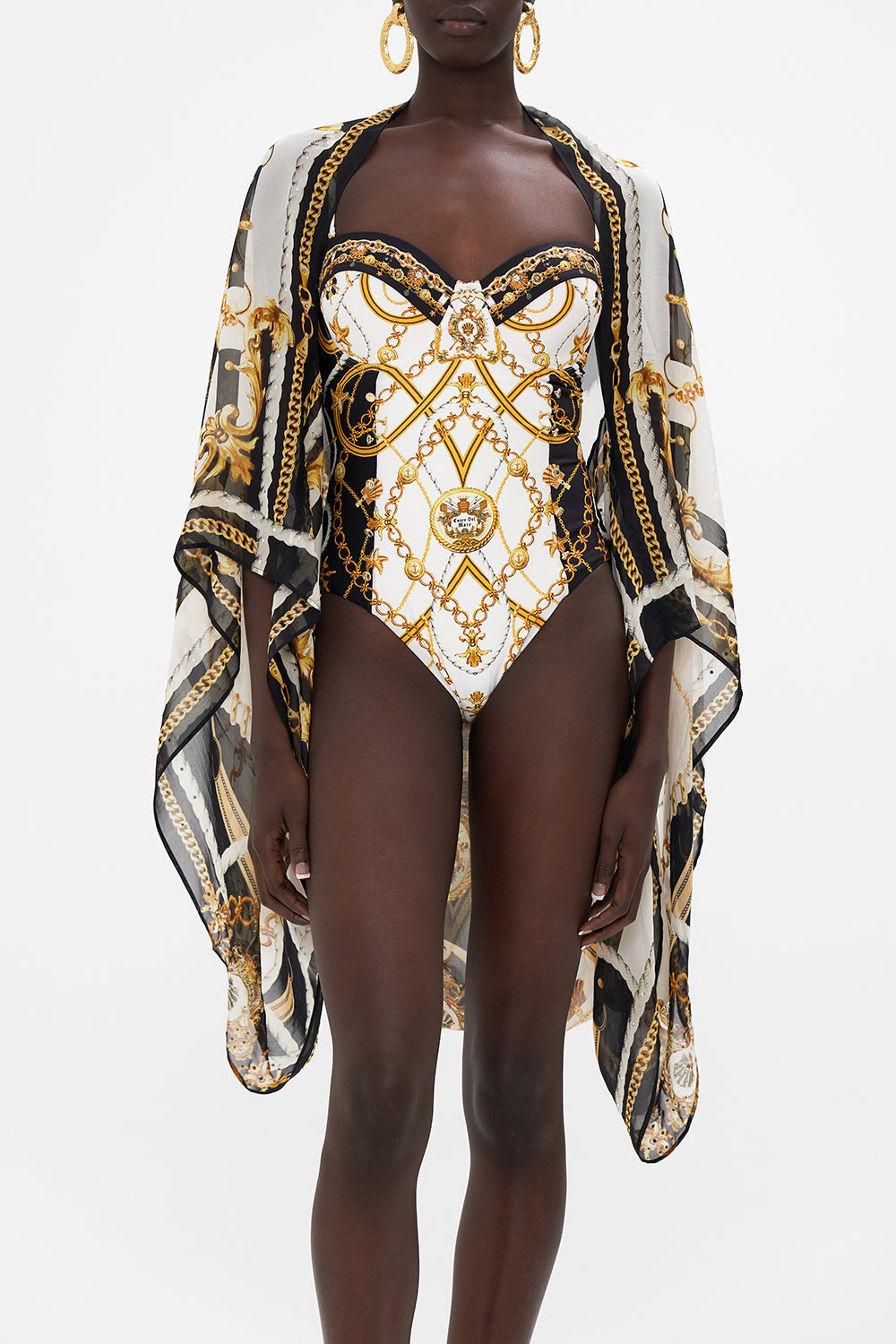 Crop view of model wearing  CAMILLA silk shrug in Sea Charm print 