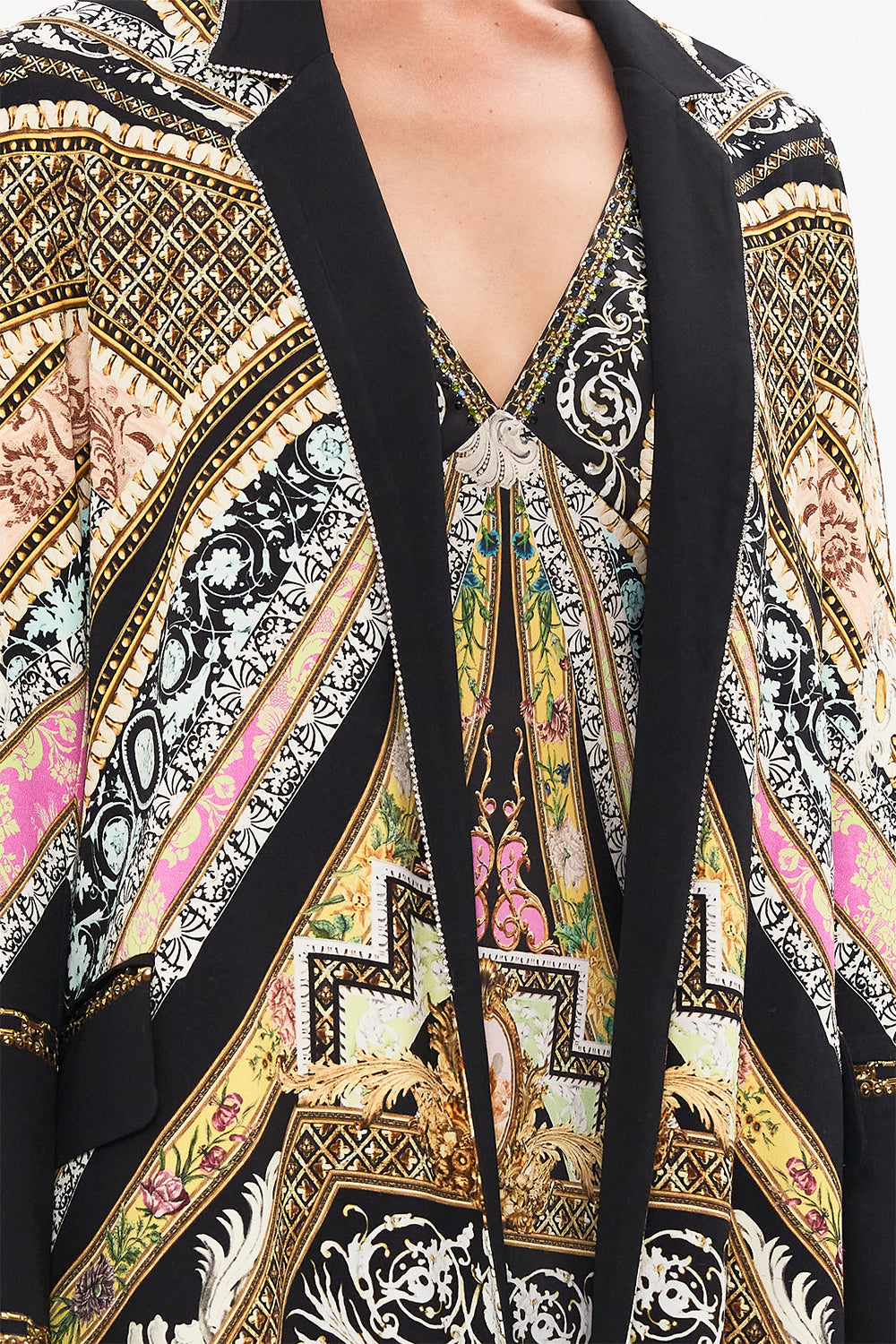 Detail view of model wearing CAMILLA silk coat in Florence Field Day print