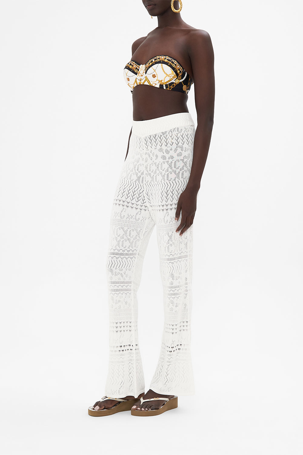 Side view of model wearing CAMILLA knit pants in Sea Charm 