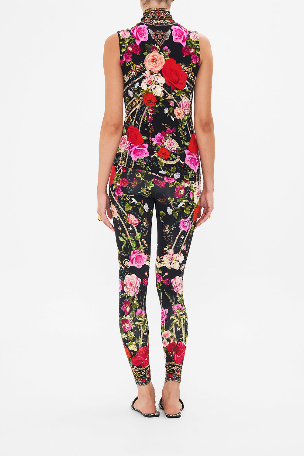 Back view of model wearing CAMILLA jersey sleeveless turleneck top in Reservation For Love print