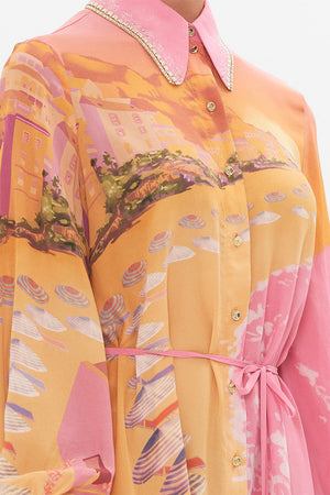 Detail view of model wearing CAMILLA silk shirt dress in Capri Me print