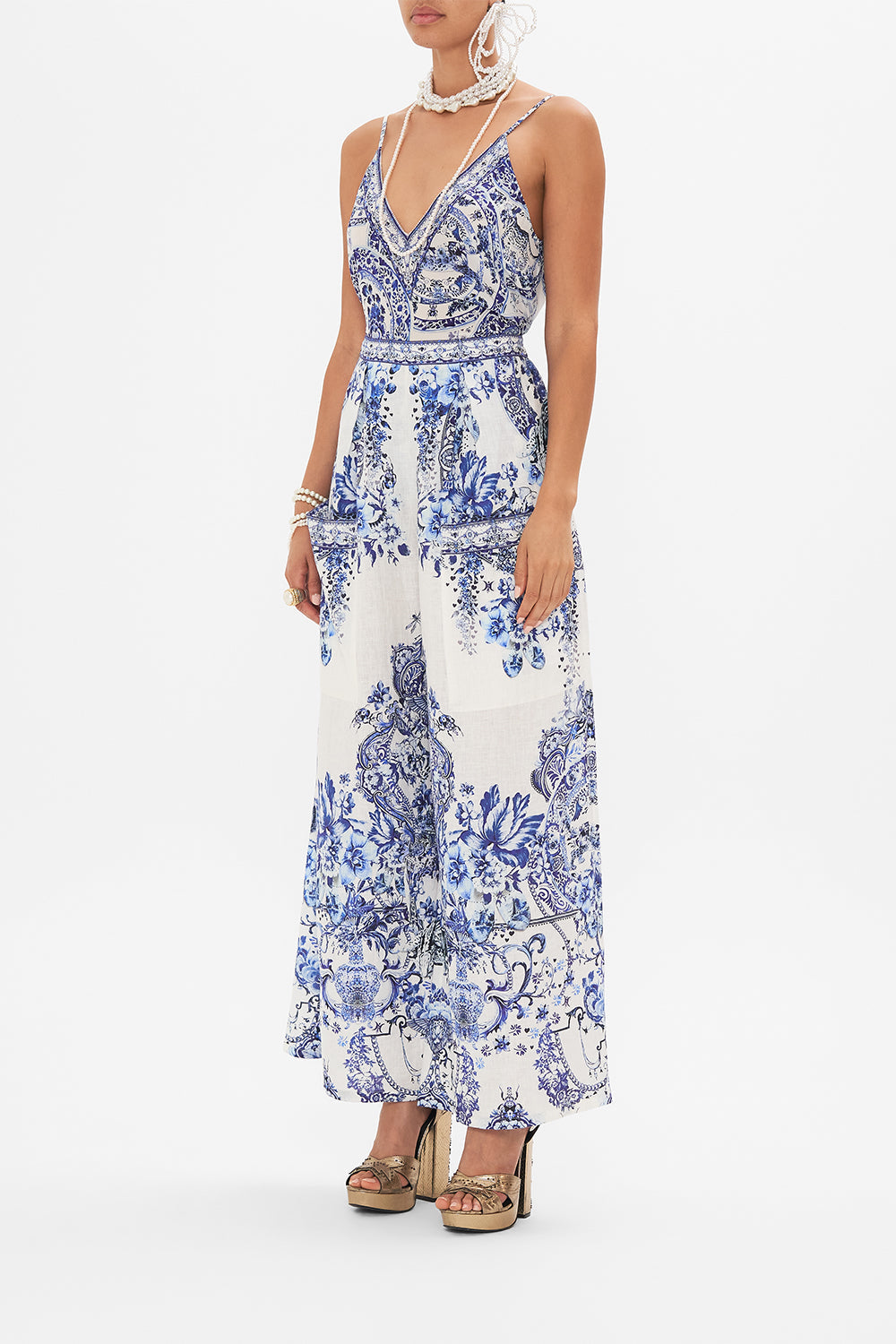 Side view of model wearing CAMILLA silk trouser in Glaze and Graze print 