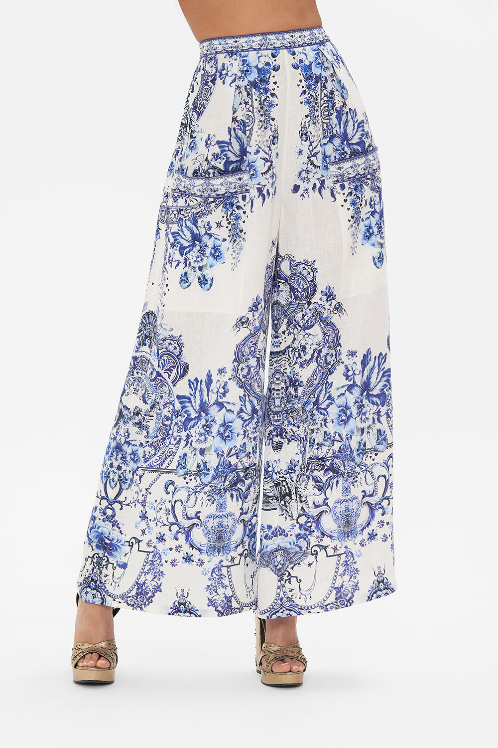 Crop view of model wearing CAMILLA silk trouser in Glaze and Graze print 