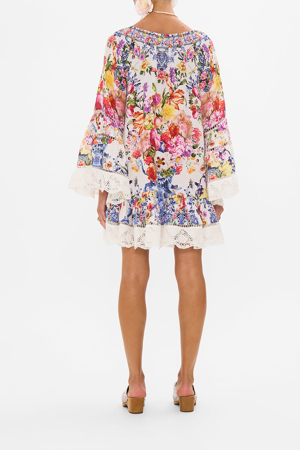 Back view of model wearing CAMILLA frill dress in Dutch Is Life print