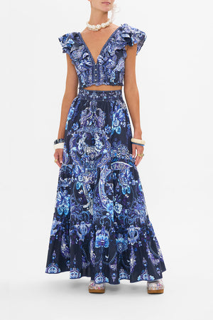 Front view of model wearing CAMILLA maxi skirt in Delft Dynasty print