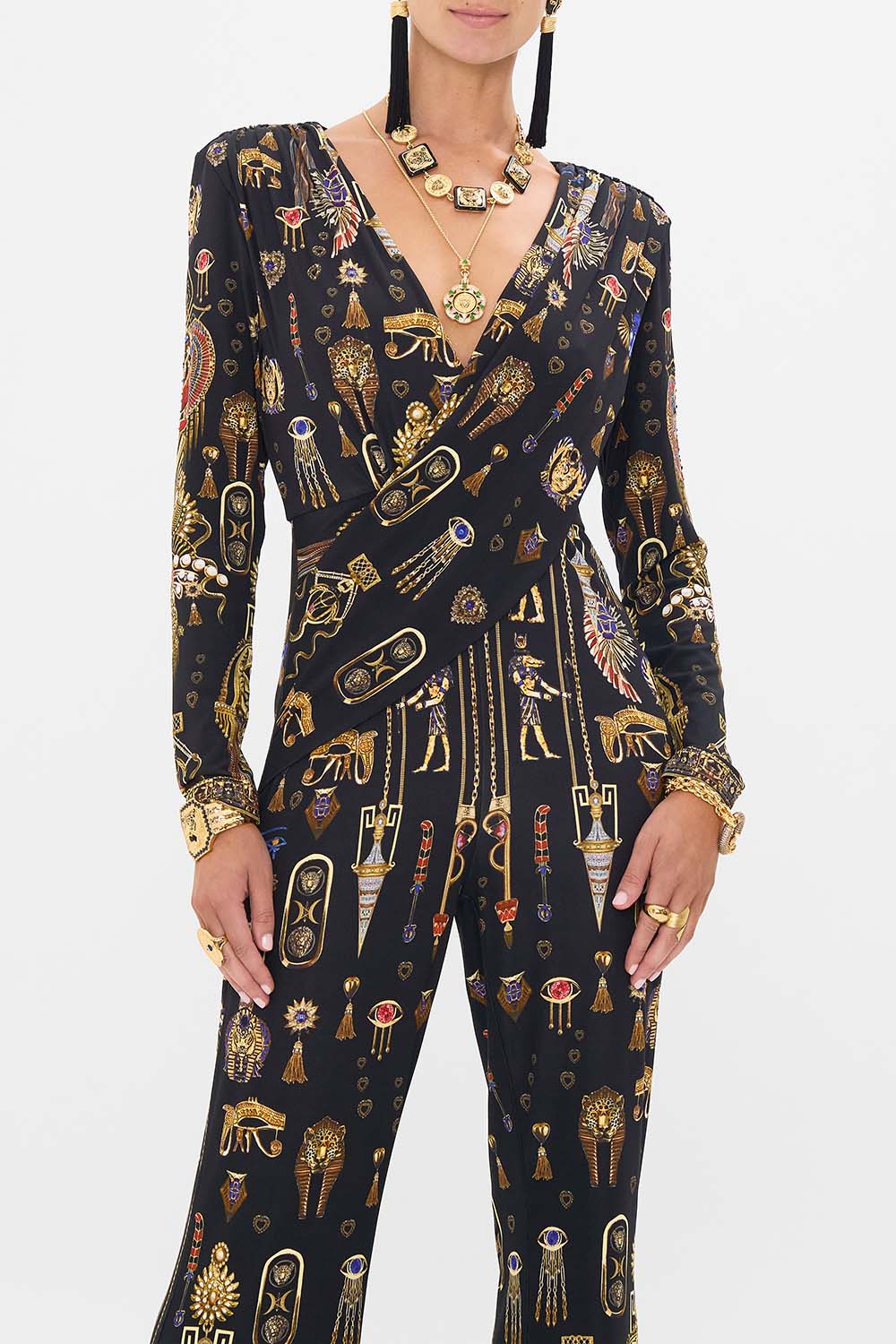 CAMILLA Draped V Neck Jersey Flared Jumpsuit in Cartouche Kingdom print. 