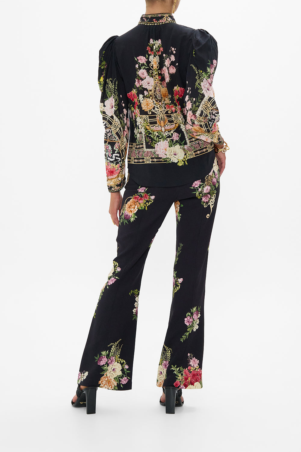 The CAMILLA SLEEVELESS DRAPED T BACK LONG DRESS SAHARA STARLET in our  print.