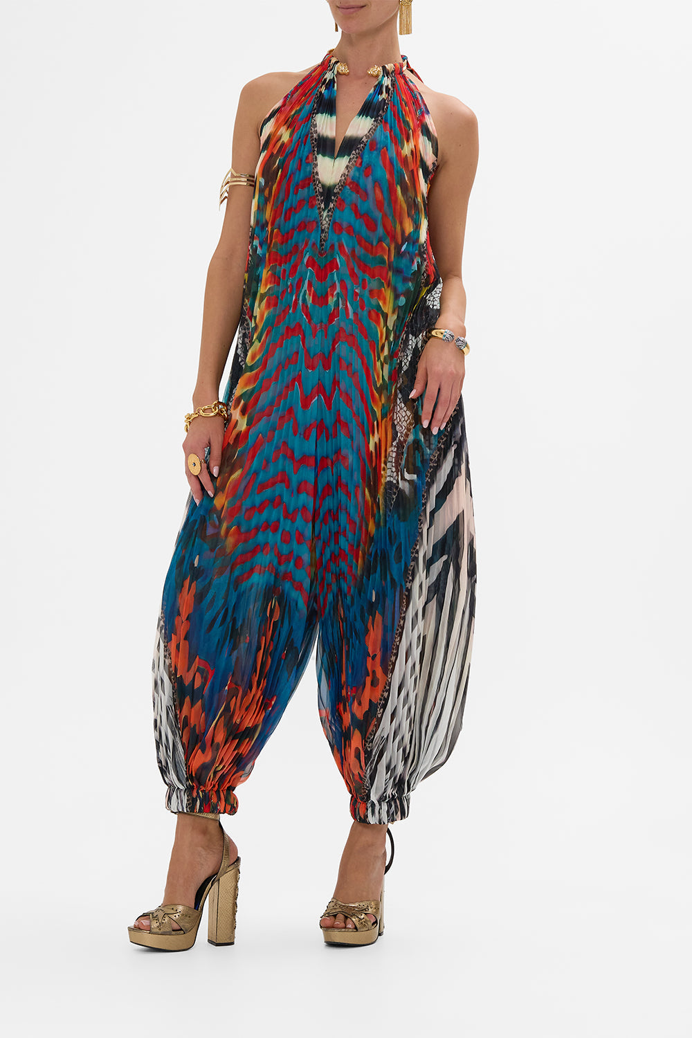CAMILLA plisse jupsuit with neckpiece in Desert Visions print.