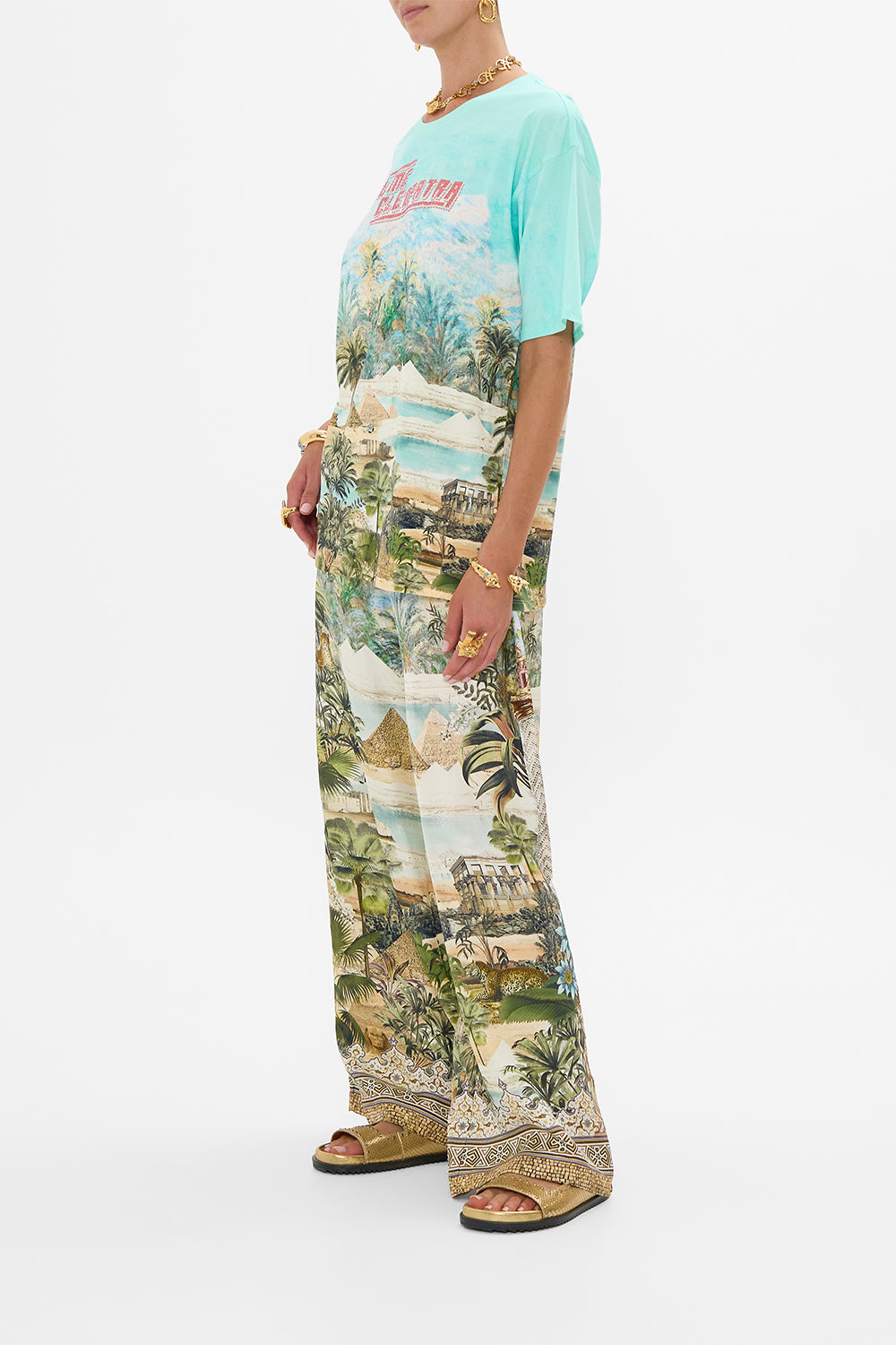 The CAMILLA STRAPLESS JUMPSUIT WITH D RING BELT DANCING WITH DAYLIGHT in our DANCING WITH DAYLIGHT print.