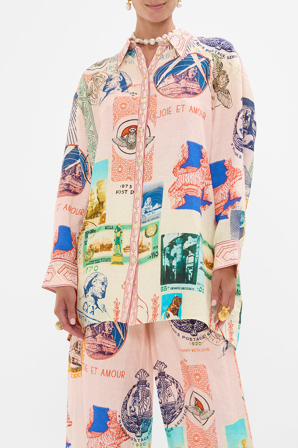 CAMILLA long line shirt with yoke and button detail in Haute Passport print. 