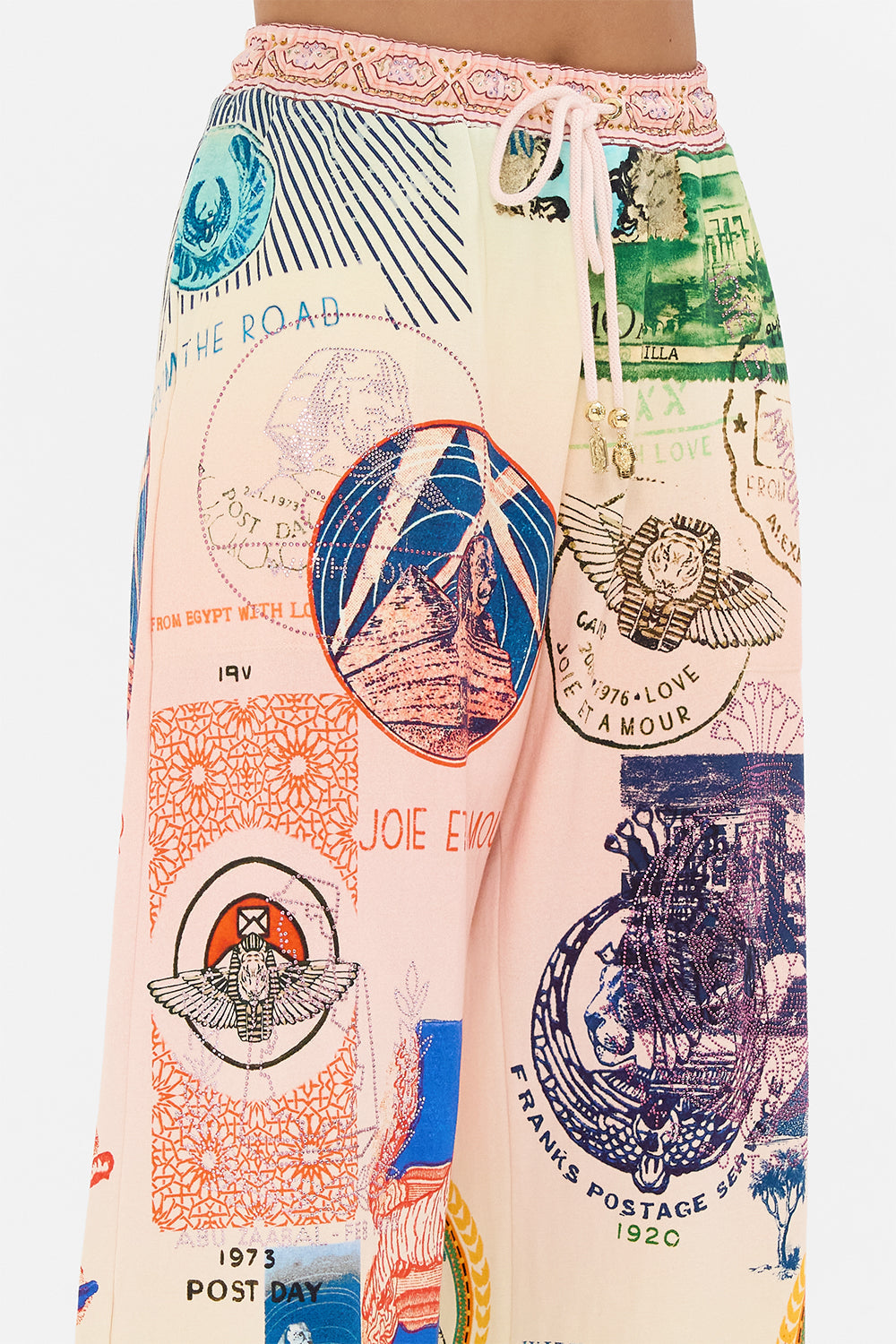 CAMILLA blush straight leg track pant in Haute Passport print. 