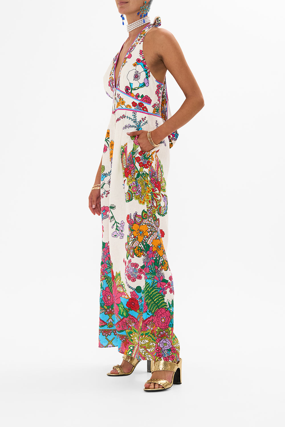 CAMILLA retro floral halterneck jumpsuit in Cosmic Prairie print. 