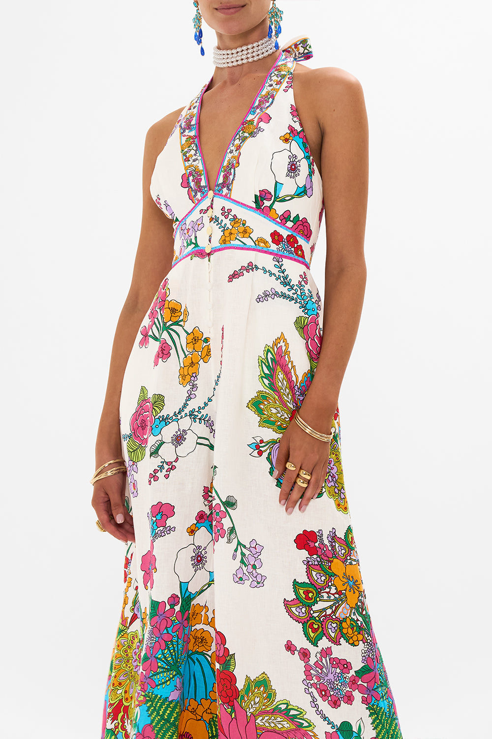 CAMILLA retro floral halterneck jumpsuit in Cosmic Prairie print. 