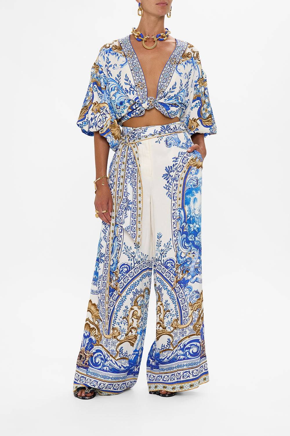 The CAMILLA STRAIGHT LEG PANT WELCOME TO THE WHITE LOTUS in our  print.