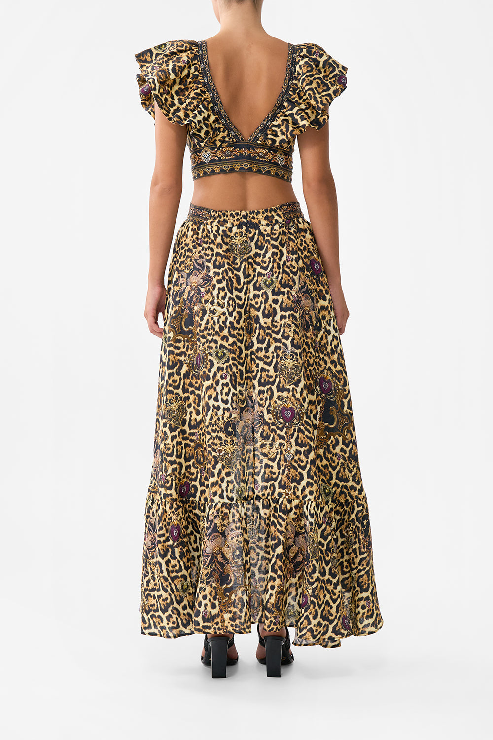 The CAMILLA PLUNGE FRONT HALTER ONE PIECE WITH TRIM THRONE GAMES in our  print.
