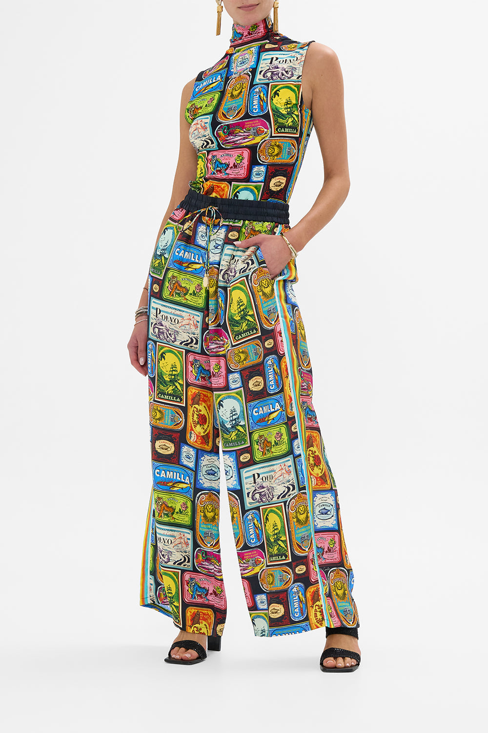 The CAMILLA LONG SPLIT FRONT TWIST DRESS THE EGYPT EFFECT in our  print.