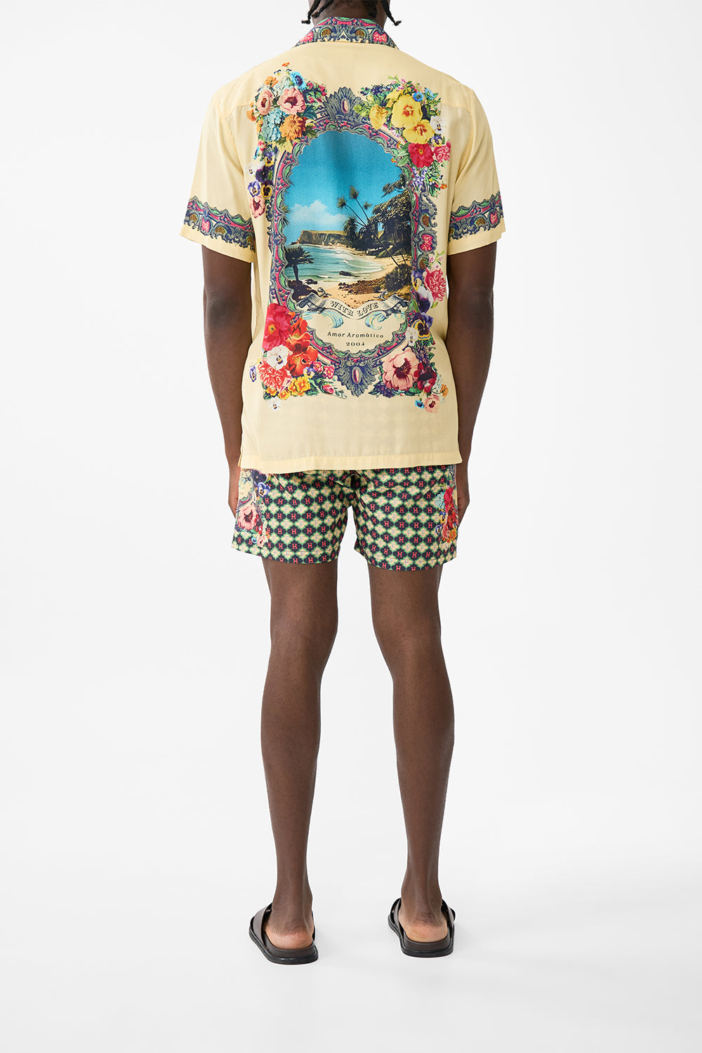 The CAMILLA MID LENGTH BOARDSHORT WITH ELASTIC WAIST TILES DARLS in our  print.