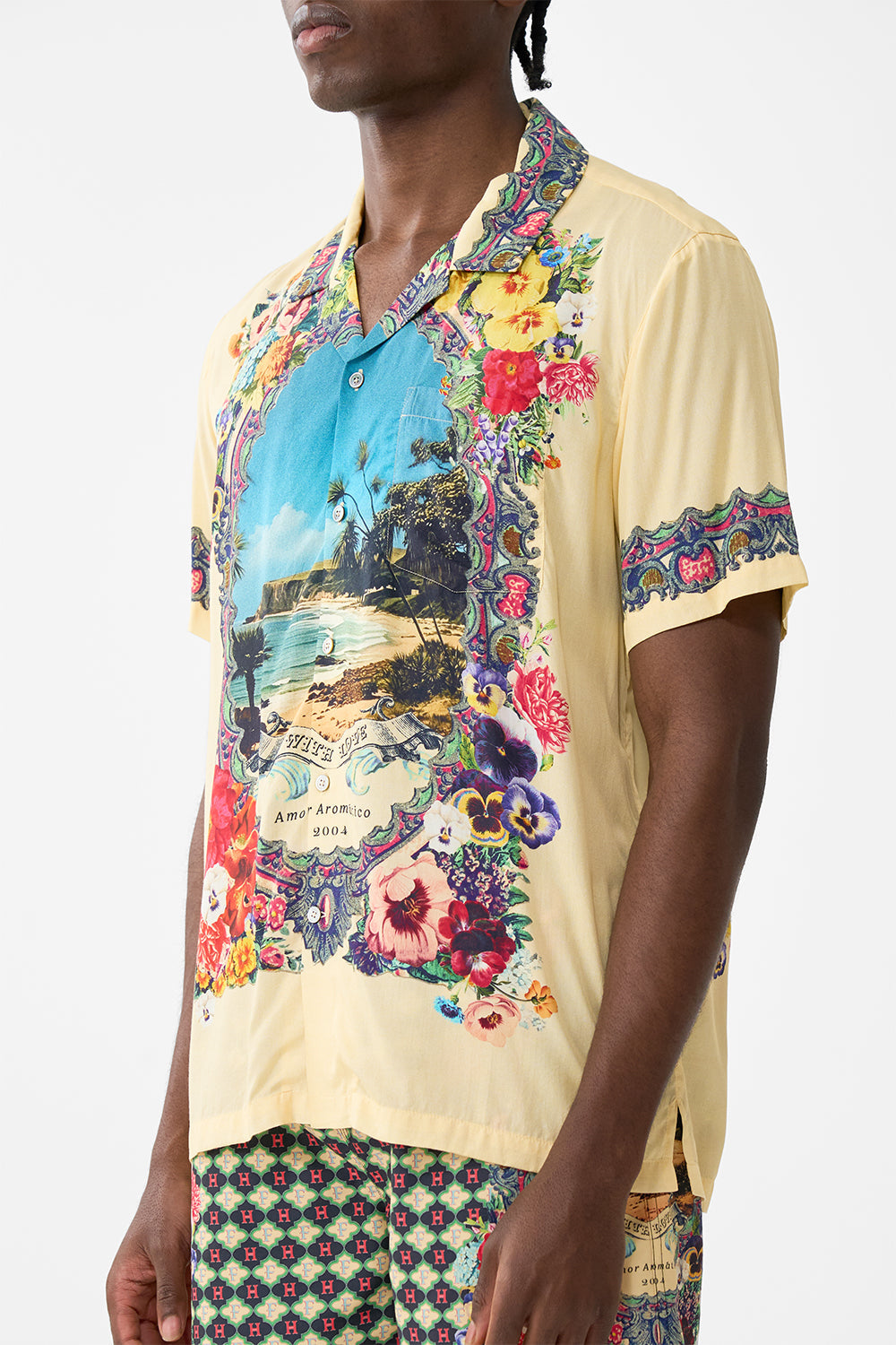 The CAMILLA MID LENGTH BOARDSHORT WITH ELASTIC WAIST TILES DARLS in our  print.