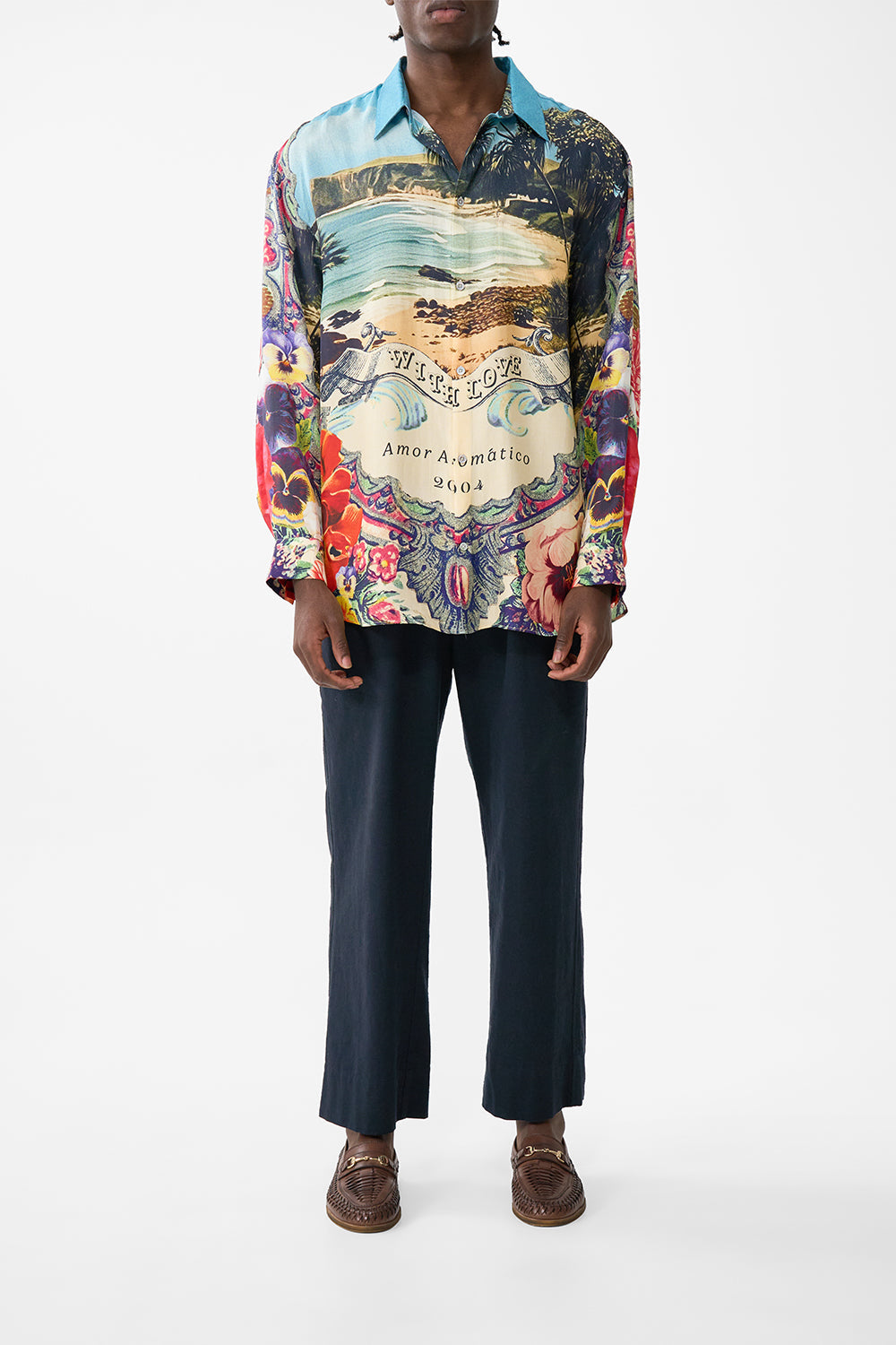 The CAMILLA BUTTON FRONT T-SHAPE KAFTAN DOMINICAN DECADENCE in our  print.