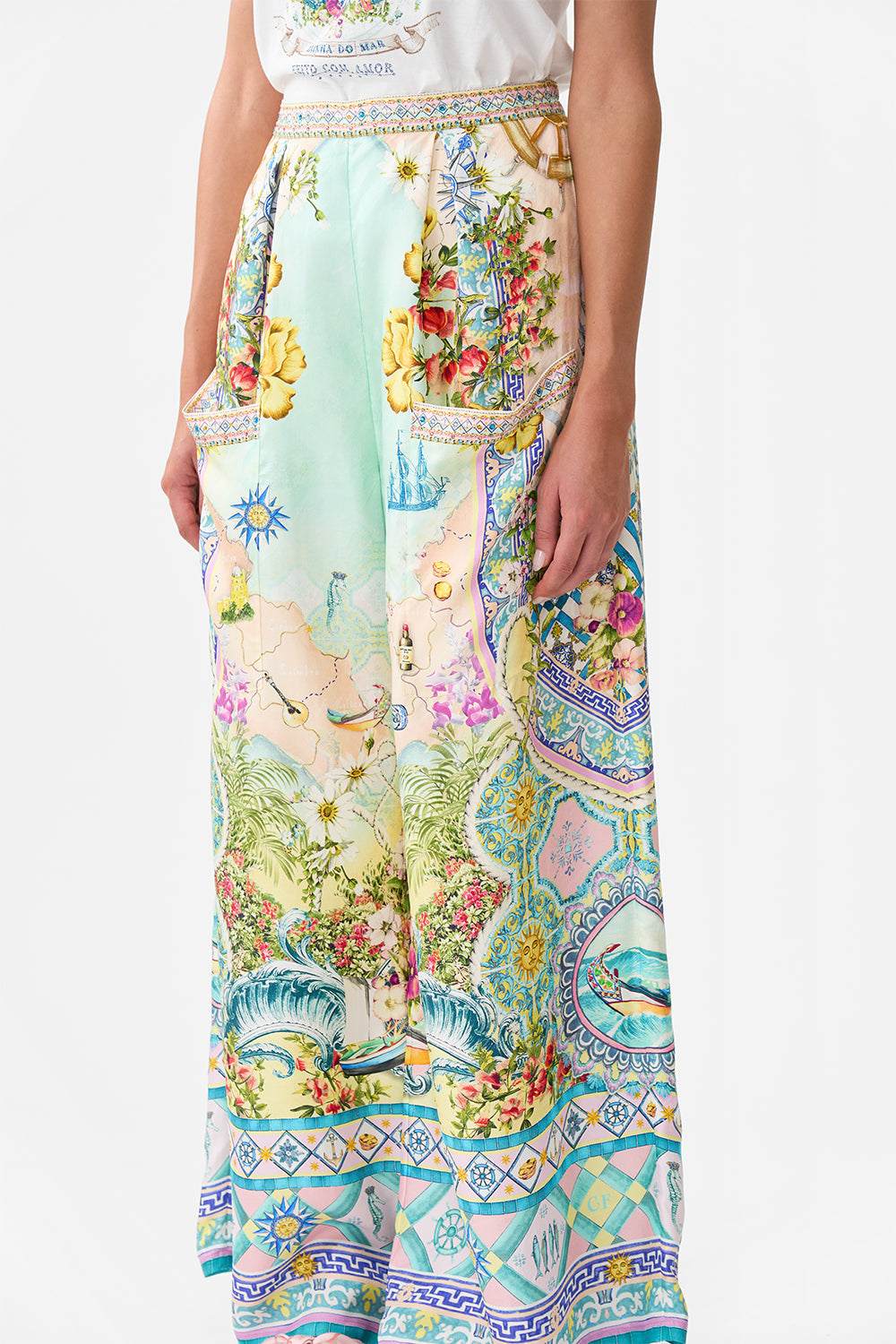 The CAMILLA DEEP V KAFTAN WITH CUT-OUT DETAIL AROMATIC TIGER FLOWER in our  print.