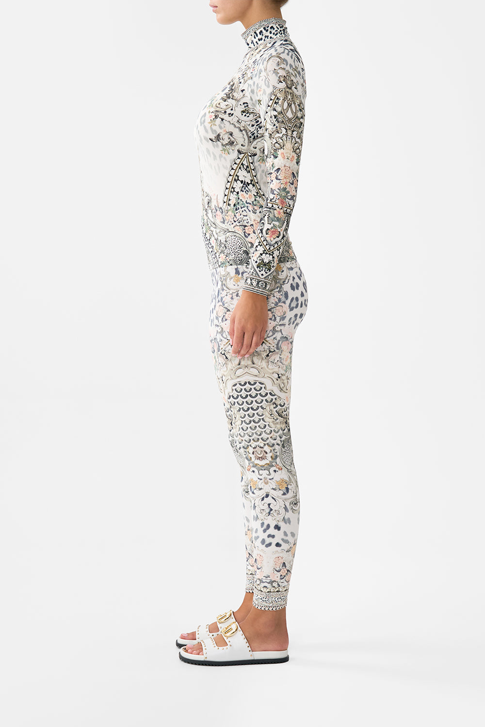 The CAMILLA BUTTON FRONT HALTER PLAYSUIT NOTES FROM THE ROAD in our  print.