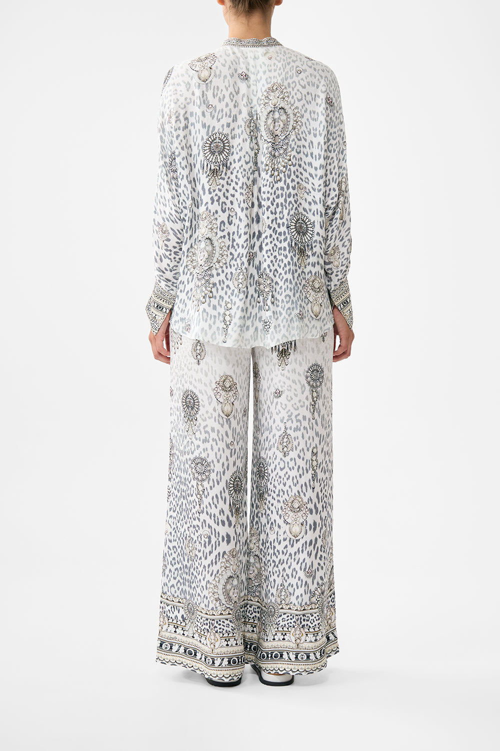 The CAMILLA MULTI WEAR LONG SARONG SONG OF THE SOLSTICE in our  print.