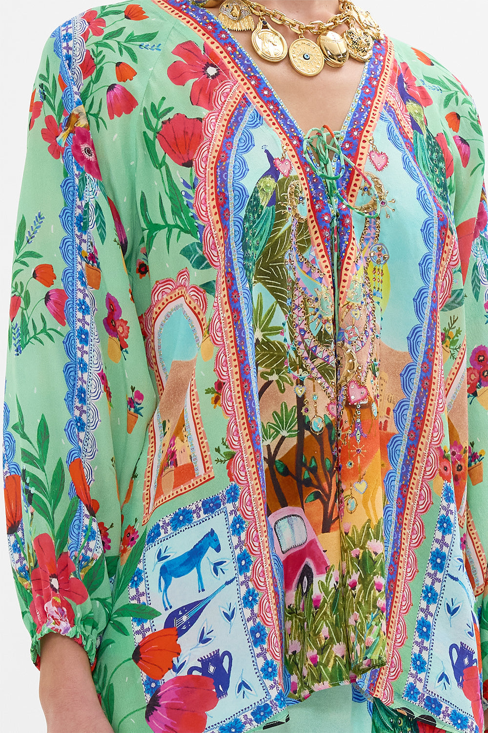 CAMILLA Lace Up Blouse in Queens of Creation print. 