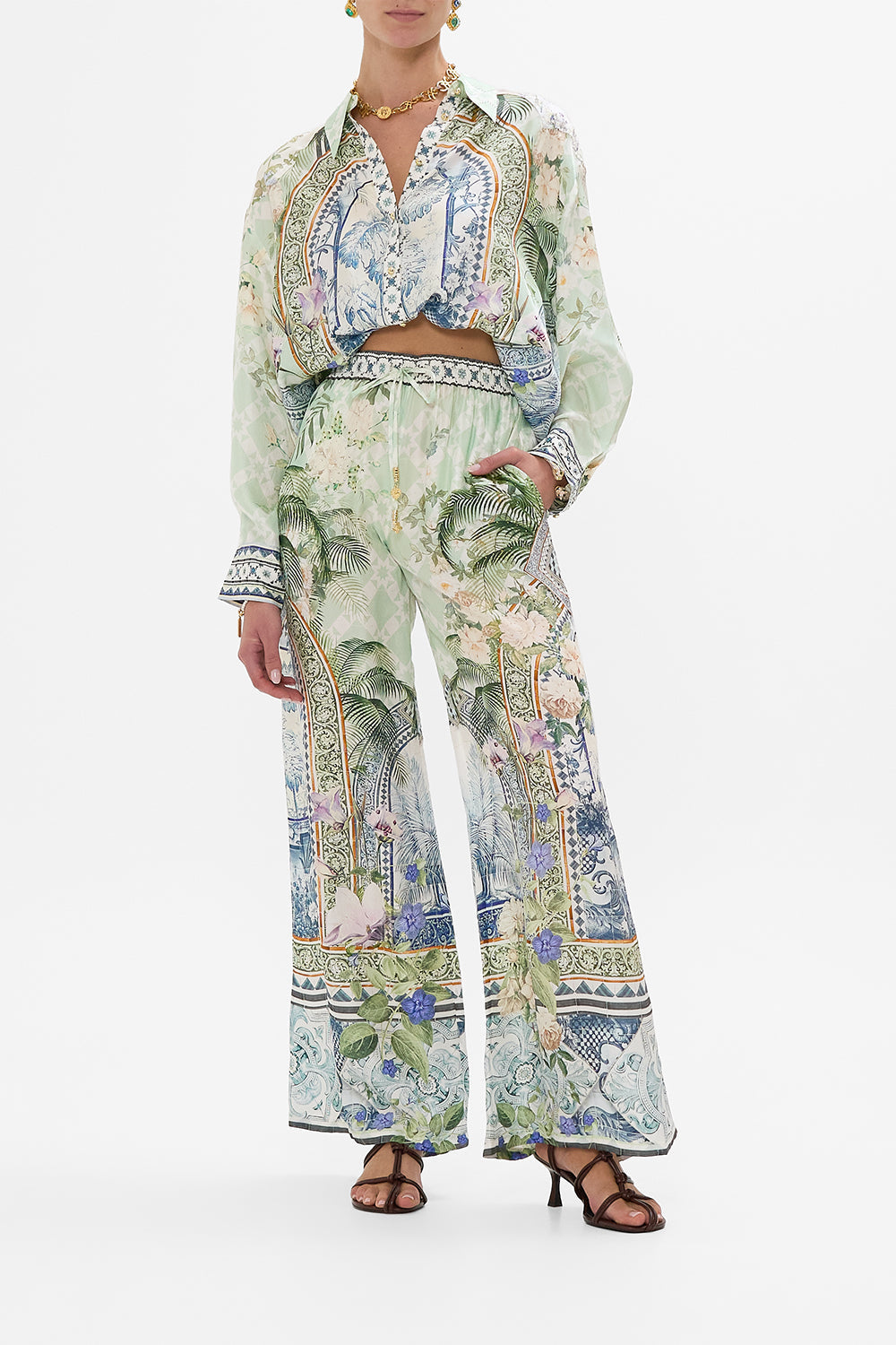 The CAMILLA LONG ROBE WITH NARROW COLLAR AND FEATHERS BASKED IN BAROQUE in our  print.